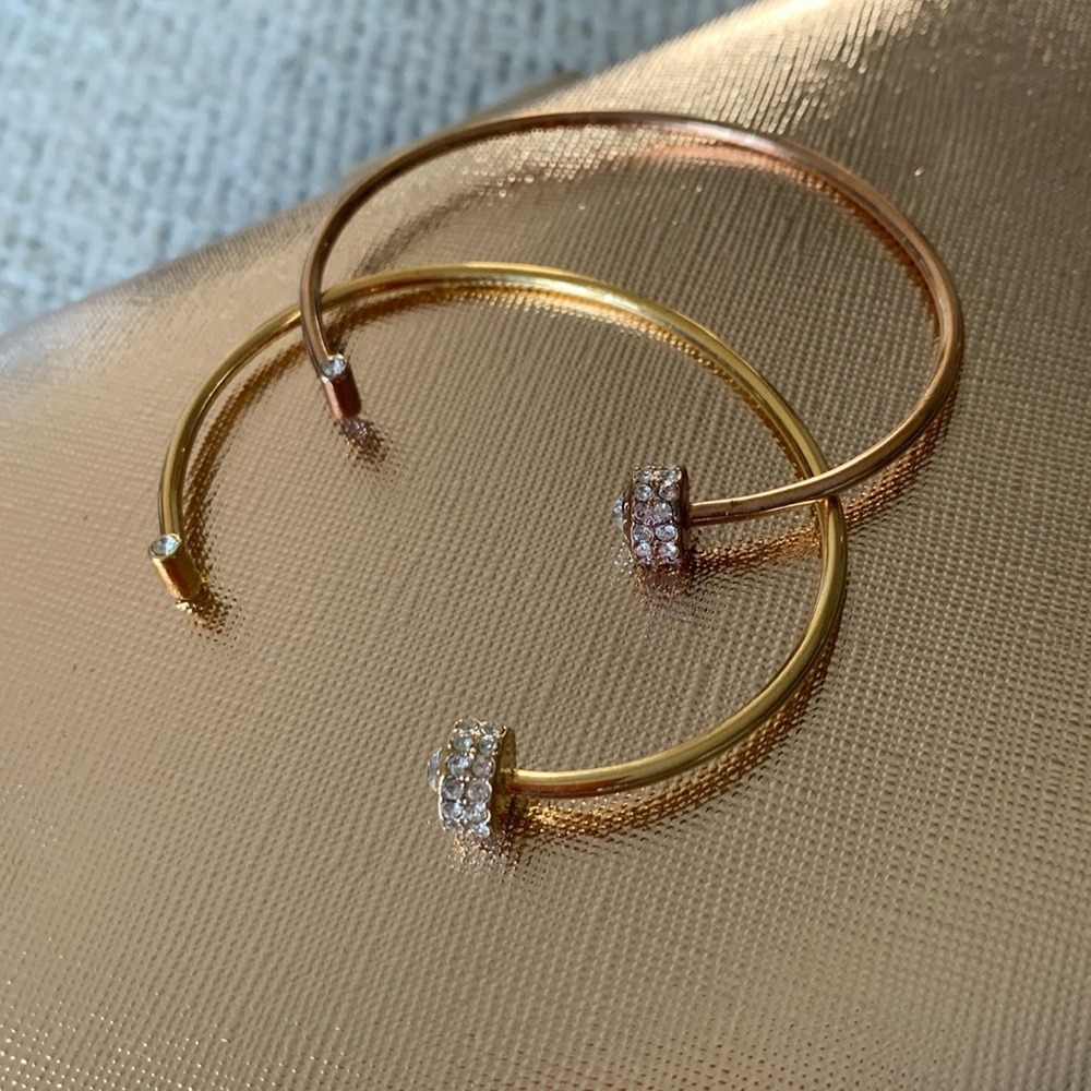 Henri Bendel bracelets. 1 rose gold  1 yellow gold plated. gift from Naples Fl.